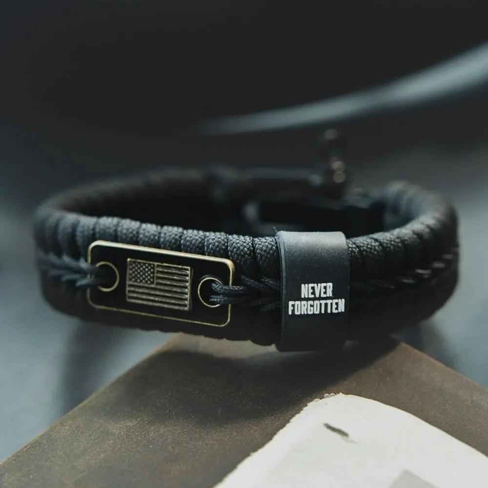 Never Forgotten Black Paracord Bracelet TT: Helps Pair Veterans With A Service Dog Or Shelter Dog