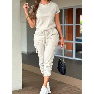 Women’s casual wide-leg jumpsuit with a crew neck, short sleeves, and a drawstring waist, designed for a fitted look