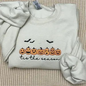 It’s the season for pumpkin-embroidered women’s pullovers/sweatshirts; Halloween sweatshirt; spooky season sweatshirt; spooky season; spooky szk; spooky skeletons; skeleton sweatshirts
