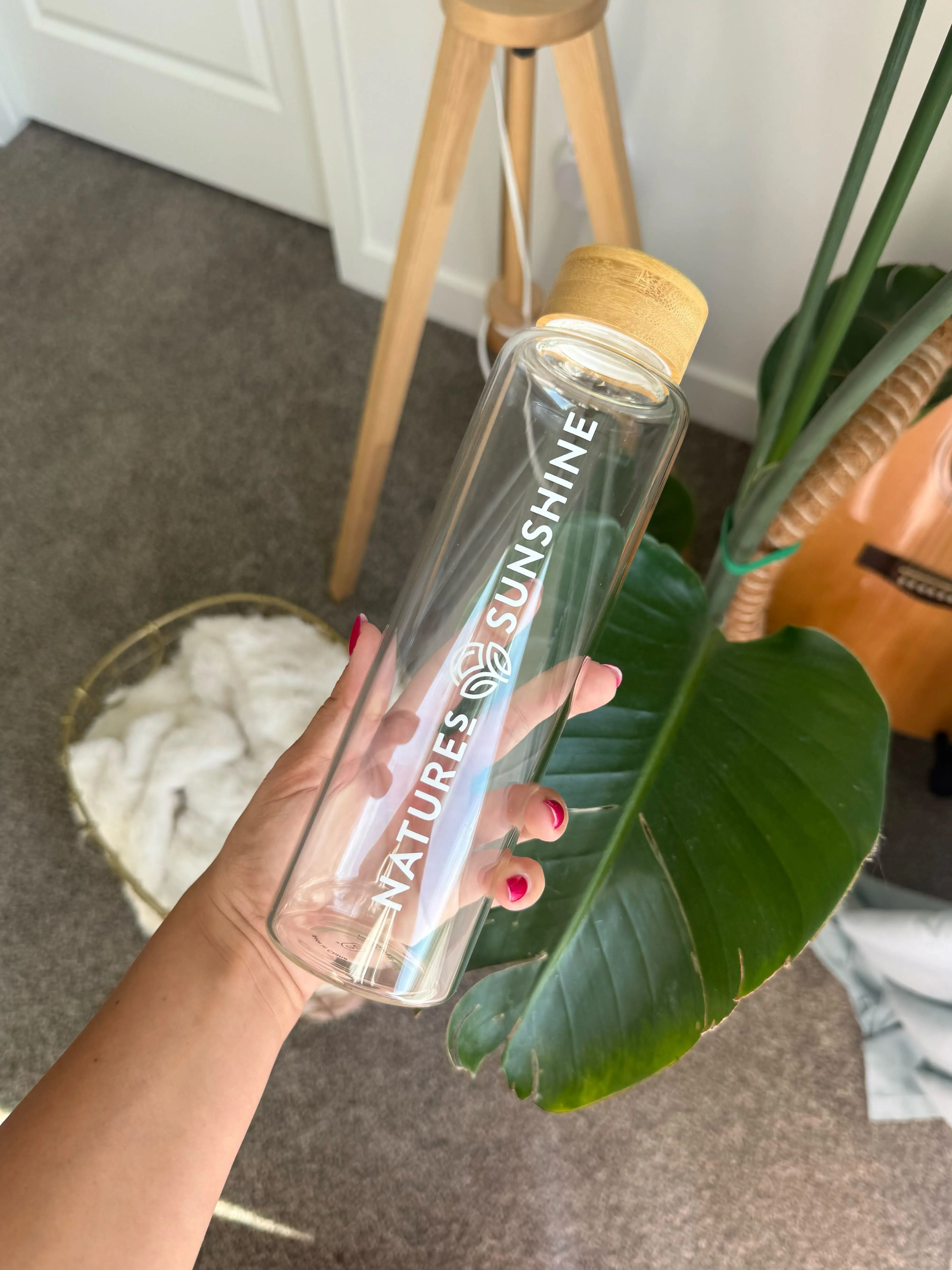 Glass Water Bottle: Nature's Sunshine