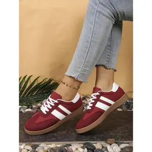 Stylish burgundy lace-up sneakers for women—comfortable, lightweight casual shoes with a trendy fashion design for daily walks and streetwear; versatile trainers that go with everything, featuring a soft, durable sole.