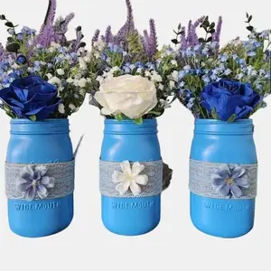 Charming Handcrafted Mason Jar Centerpiece with Blue & White Roses, Baby's Breath, and Lavender - Rustic Wedding and event decor