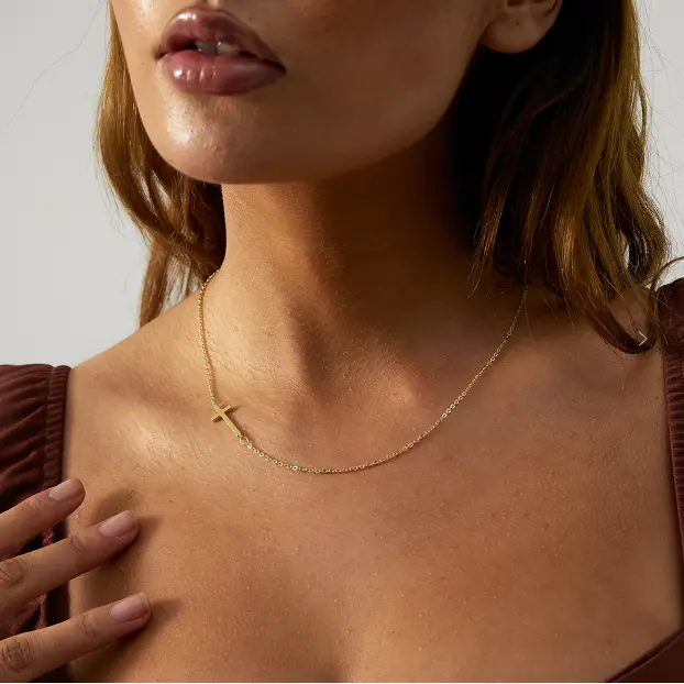 sideways  golden cross off center