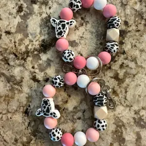 Pink cow silicone wristlet