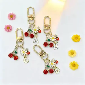Unisex Assorted Initial Keychains Gold Plated Enamel Butterfly Cherry Daisy Ladybug Charm Key Ring Lobster Clasp Bag Charm Personalized Fashion Accessory Gift for Women Men