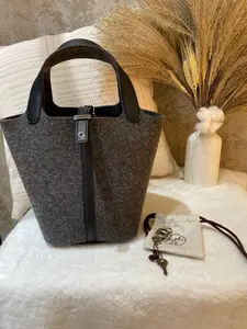 Pre-owned HERMÈS Picotin Lock 18 PM Tote, purchased in 2020, features grey felt with black leather trim 1919