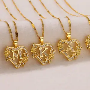 18k gold necklace with heart shaped initials and elegant CZ stones for women to wear everyday and as a gift