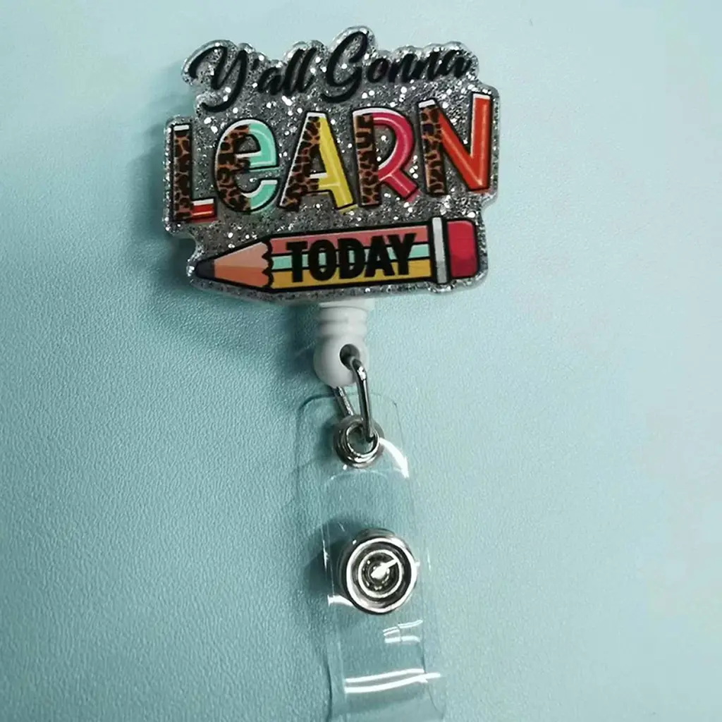 An educational-themed badge retractable buckle with glitter effect, printed with the text "Y'all Gonna LEARN TODAY", the letters "LEARN" decorated with leopard print and other patterns, Classroom supplies