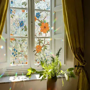 1 roll iridescent window film with floral and bird pattern, decorative privacy film for glass. Static cling, self-adhesive, removable and easy to apply. Ideal for windows and doors, enhancing home aesthetics and room décor.