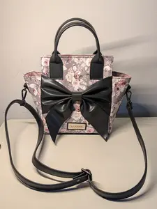 Women's roses and black bow tie hand bag