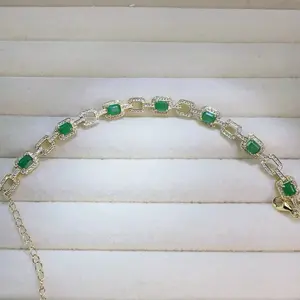 <PingEast Jewelry>Emerald bracelate--925 Sterling Silver Gold-Tone Interlocking Link Bracelet set with 7 natural Colombian emerald-cut Colombian emeralds, approximately 0.5ct each. Elegant, timeless, and effortlessly versatile — a classic piece perfect fo