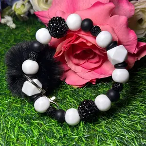 Tv snow wristlet keychain color scheme black, white and bling beads made with wire