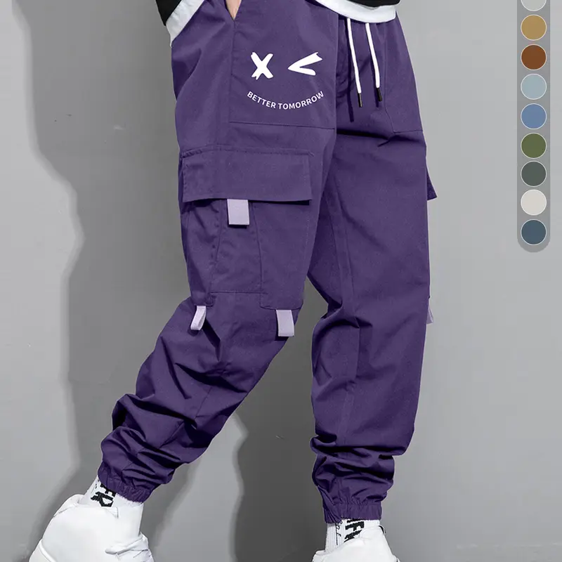 sweats Men's multi-colored work pants with an elastic waistband, loose fit, and multiple pockets, featuring side letter prints, suitable for street style and everyday wear.work pants for men Casual Jogger Menswear Stylish mens pants Trouser