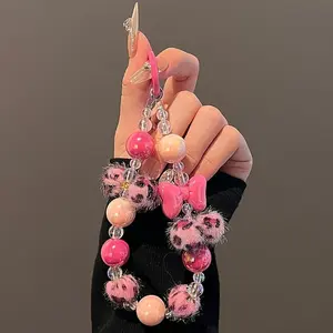 1 pink fur ball three-dimensional bow phone chain, Cell Phone Charm, Phone Accessories, paired with a phone, key, and bag for autumn and winter, creating a girlish atmosphere