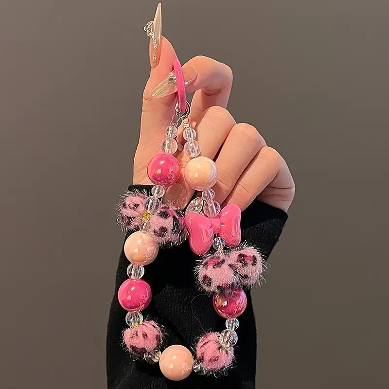 1 pink fur ball three-dimensional bow phone chain, Cell Phone Charm, Phone Accessories, paired with a phone, key, and bag for autumn and winter, creating a girlish atmosphere