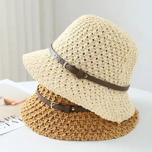 Handcrafted grass hat. Women’s hollow crocheted bucket-shaped sun hat with faux leather trim. Wide brim design provides UV protection. Fisherman’s hat style, lightweight and breathable, suitable for summer beach use and everyday wear.