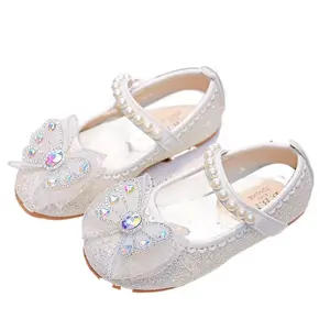 "Glamorous Glittery Kids' Flats with Pearl Accents and Bow Detail"