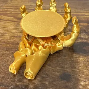 Skeleton hand self adjusting coaster Skeleton hand self adjusting coaster
