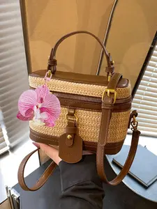 Retro casual versatile practical texture grass woven small square bag, elegant and gentle style with multiple backs, fashionable and personalized one shoulder handbag, decorated with butterfly orchid pendant