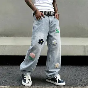 Men’s loose denim jeans, Y2K hip-hop street style, chenille patch appliqué, wide-leg denim jeans (jorts), vintage blue wash, knee-length, casual skate shorts, unisex denim apparel.