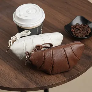2026 Wholesale Niche Design Textured Soft Leather Mini Croissant Bag Retro Exquisite Hand-Held Lanyard Coin Purse
