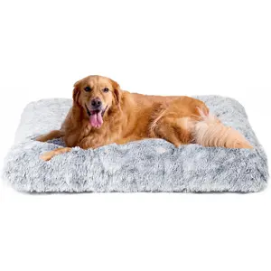 A plush dog bed suitable for extra-large dogs, featuring a soft faux fur cushion, has calming and anti-anxiety properties, is a washable, soft and warm dog pad with a non-slip bottom, and comes in gray color