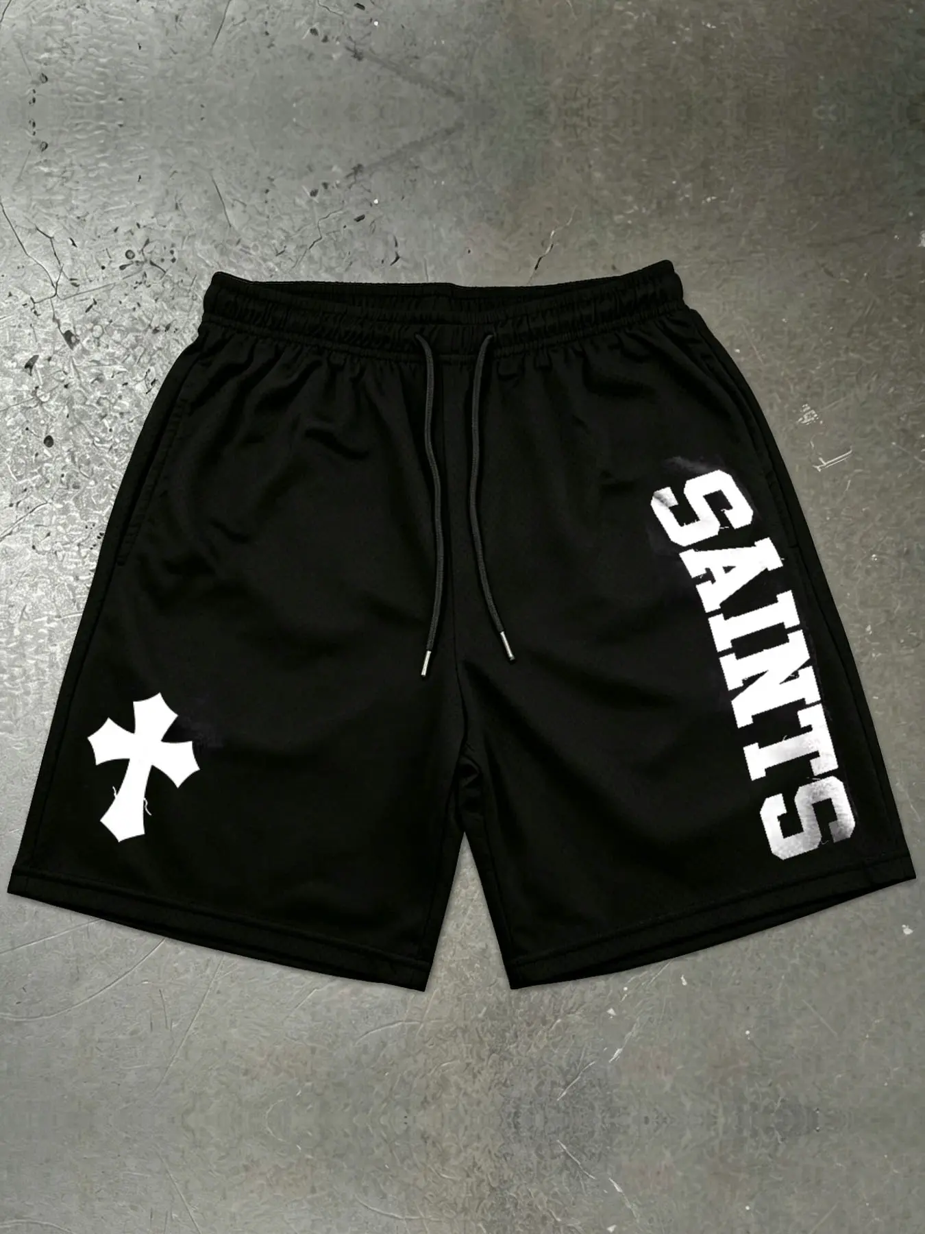 1 PCS Black Mesh Shorts, "SAINTS" Cross Graphic Print, Retro Faith-Inspired Streetwear, Breathable Drawstring Athletic Shorts, Ideal for Gym, Casual Wear & Urban Fashion Fans