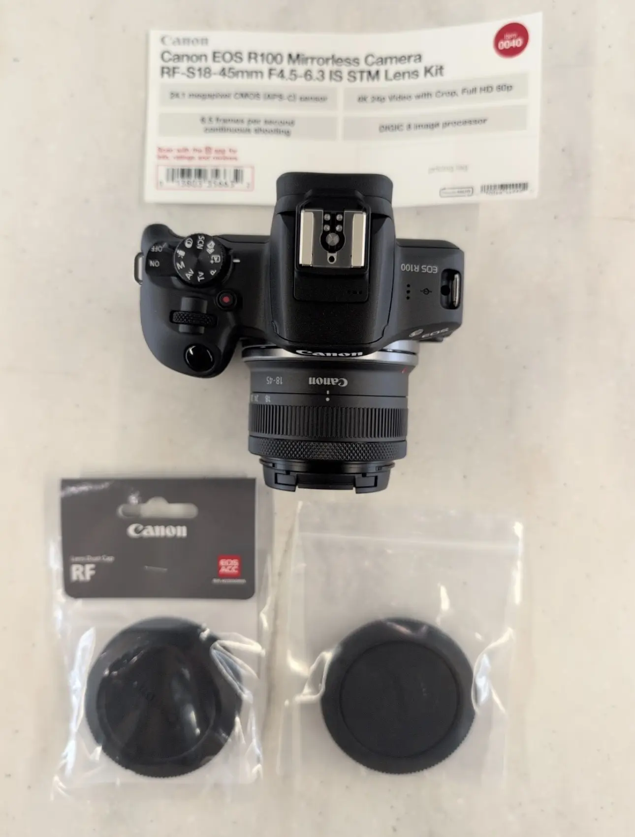 EOS R100 Mirrorless Camera RF 18-45mm f/4.5-6.3 IS STM Lens