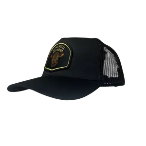 El Becerro Norteño Patch Hat - Black Trucker Cap with Embroidered Cow Design and "SE MAMÓ EL BECERO" Text