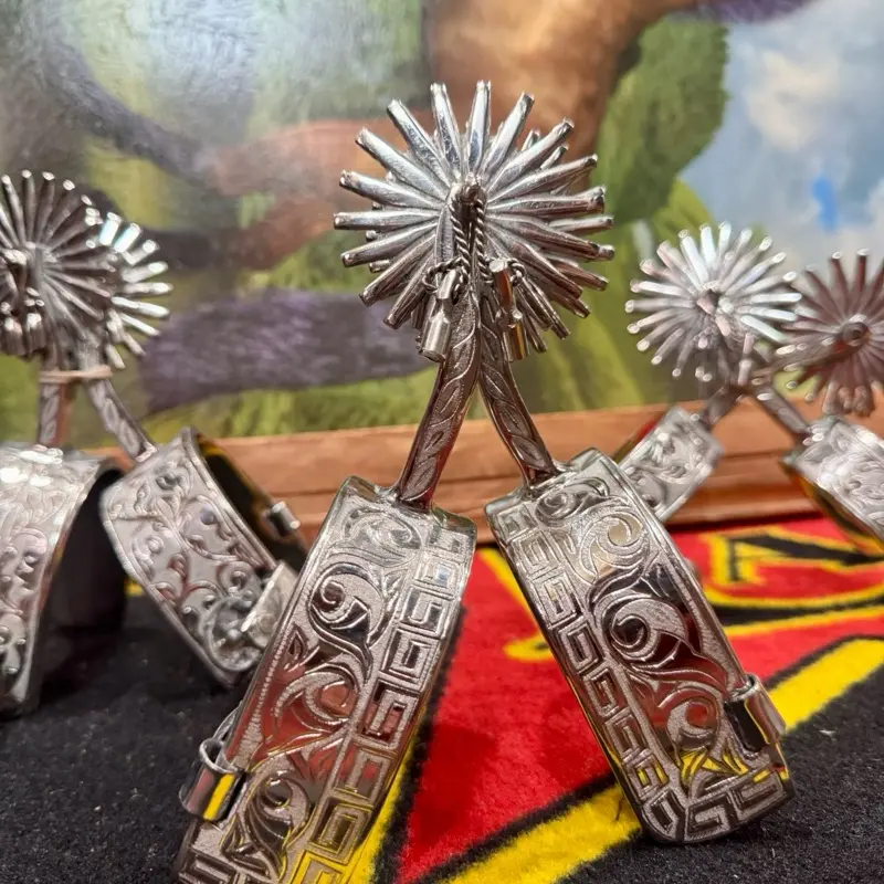 Tradicionales Espuelas charras diseñadas, con espiga larga y rodaja chilena en hacero inoxidable