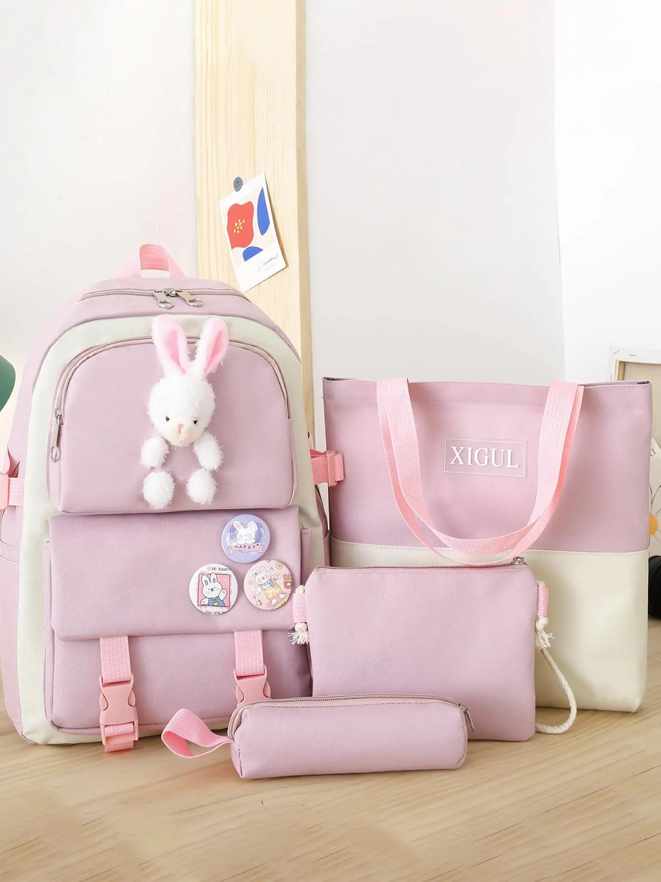 Cute, stylish and simple school bag, school backpacks with double shoulder straps and cute rabbit decorations, Bunny Bag, four-piece college style suit, high-value weight-reducing backpack, contrasting colors, versatile