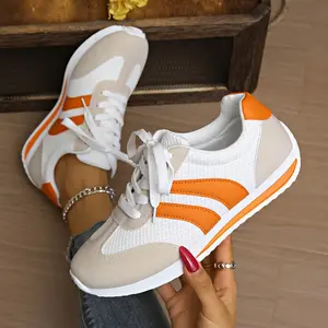 Comfortable Women's Sneakers • White & Orange Accent • Breathable Fabric Upper • Lace-Up Flat Sole Shoes • Cushioned Rubber Outsole • Gym, Office, Everyday