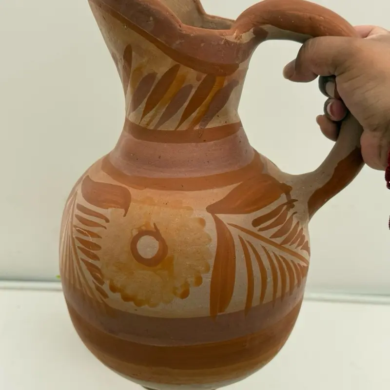 Handmade terracotta water pitcher 13” -4qts mexican vintage water pitcher. Handmade terracotta water pitcher 13” -4qts mexican vintage water pitcher.