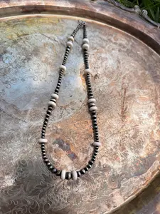 pink conch beaded necklace
