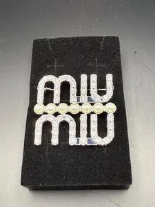 MM-Inspired Luxury Brooch