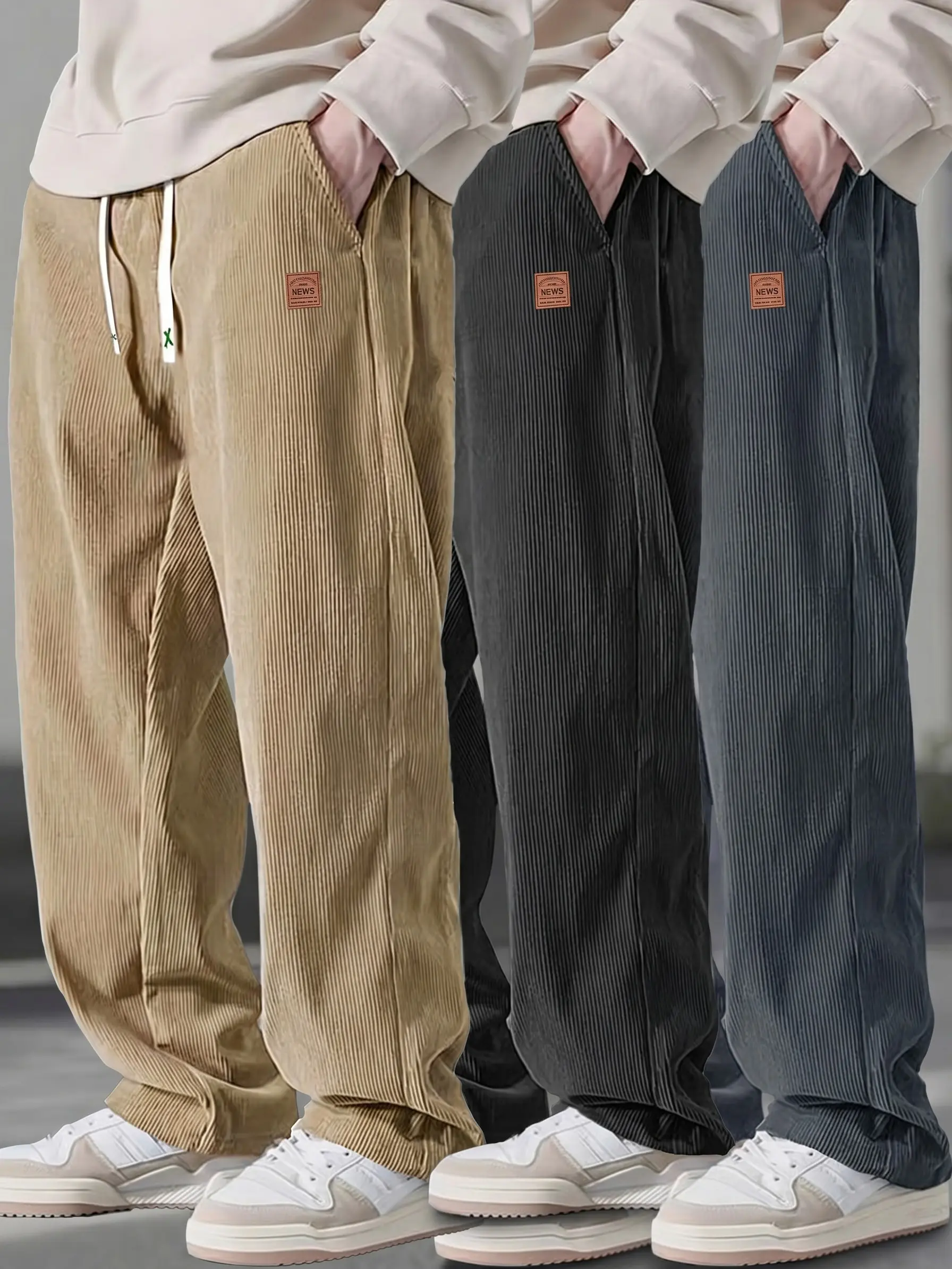 Men’s relaxed-fit black corduroy casual pants — lightweight for summer with a drapey feel, leather tag detail, drawstring elastic waistband; suitable for work and everyday wear.