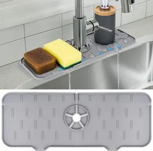 Sink splash guard - silicone faucet handle drip filter tray, dishwashing soap dispenser and sponge holder pad behind faucet, kitchen counter protective small tools bathroom accessories