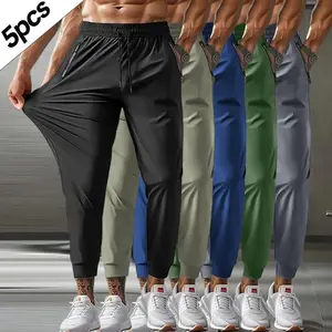 Men’s 5-piece set of solid-color athletic training pants with pockets, zippered waist, drawstring, quick-drying, high elasticity—suitable for outdoor hiking, fitness, and casual wear; all-season style GARMENTARY