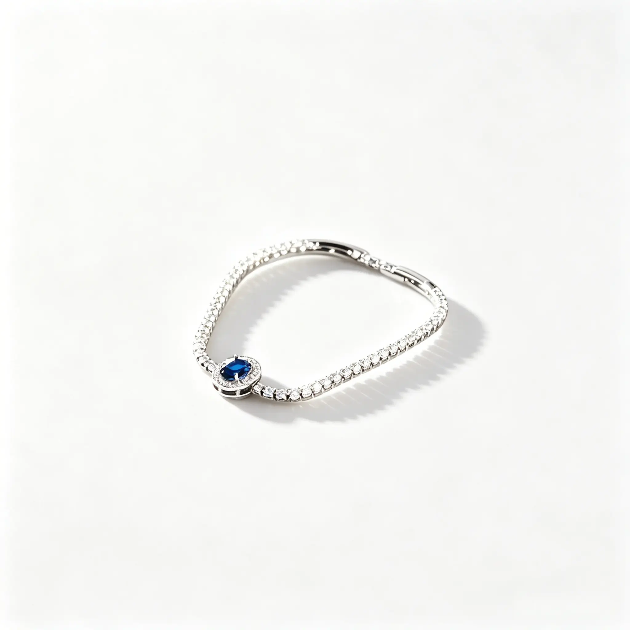 Oval Blue Sapphire & CZ Tennis Bracelet, Sparkling Silver-Tone Wrist Jewelry for Evening & Gifting