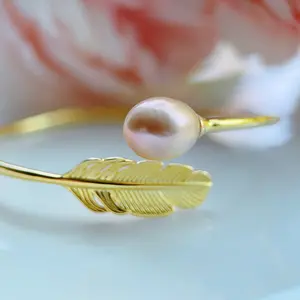 Piswency Freshwater Pearl Bangle Bracelet in Natural Champagne Color, 18K Gold Plated 925 Sterling Silver Adjustable Feather Teardrop Pearl Bangle, Gift for Her